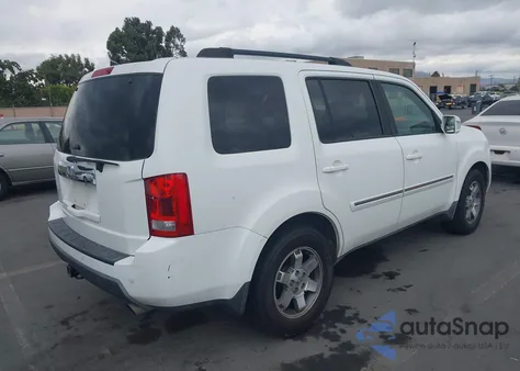 2010 Honda Pilot Touring z USA, uszkodzony, nr VIN 5FNYF3H85AB003993